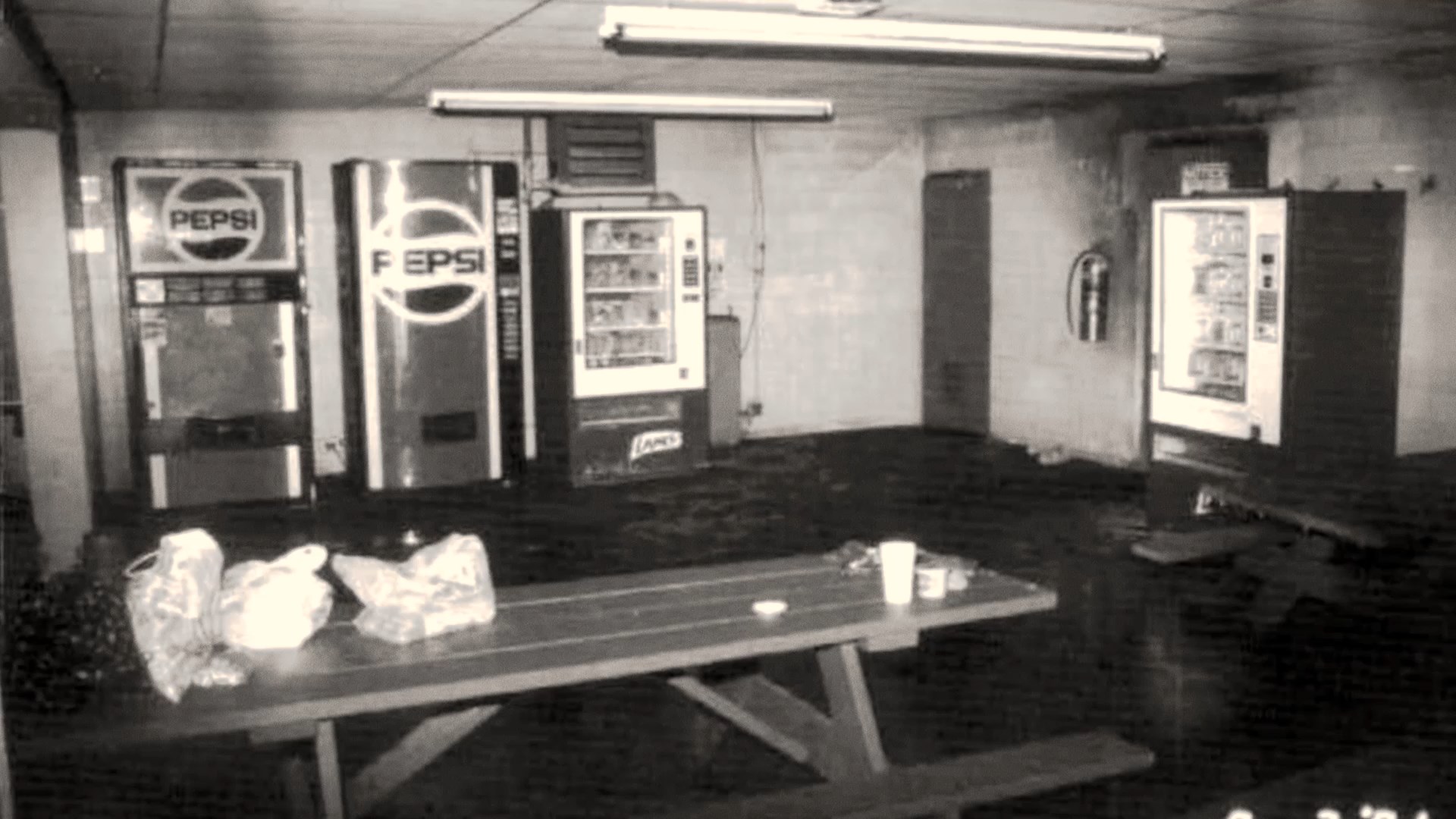 Black and white image of the Imperial Foods breakroom after the fire.